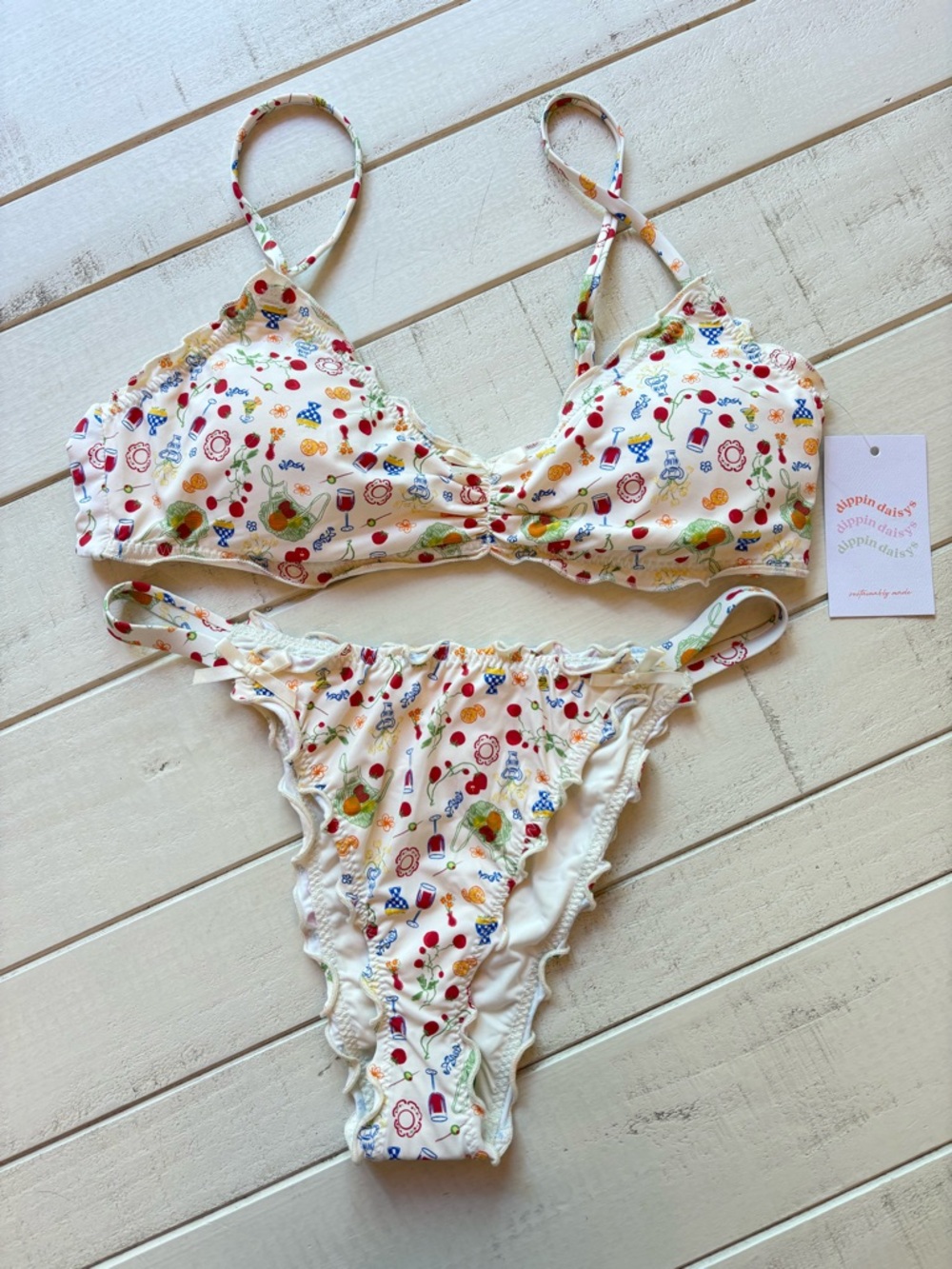 Dippin' Daisy's White Bikini Top with Red, Green & Orange Fruit Print